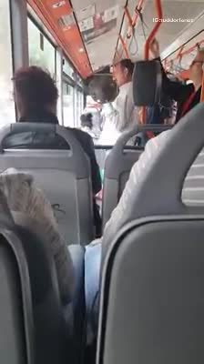 Guy doing bicep curls on train subway