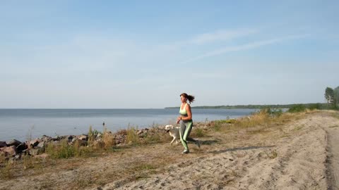 Out for a run with her pet dog