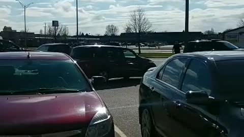 Detained Man Flees in Stolen Police Car