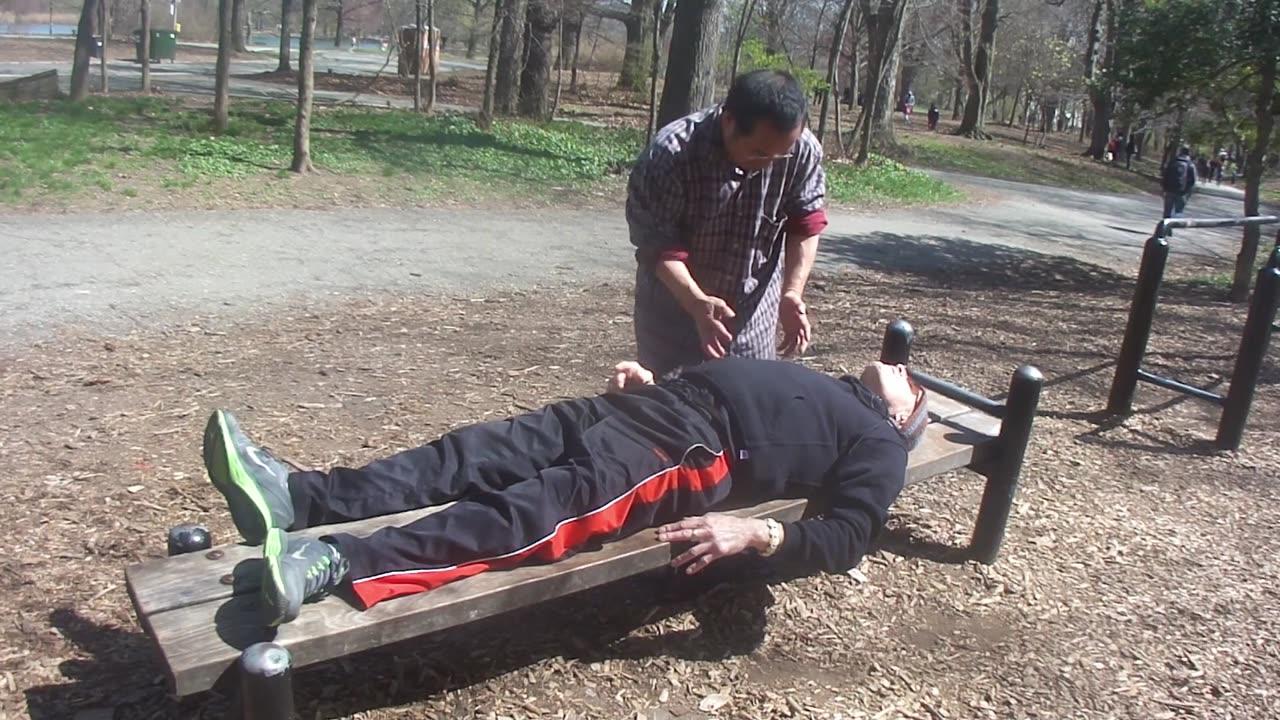 Luodong Gives Energy To Elderly White Man On Park Bench