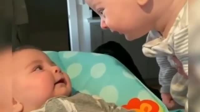 Two babies talking in their cute language