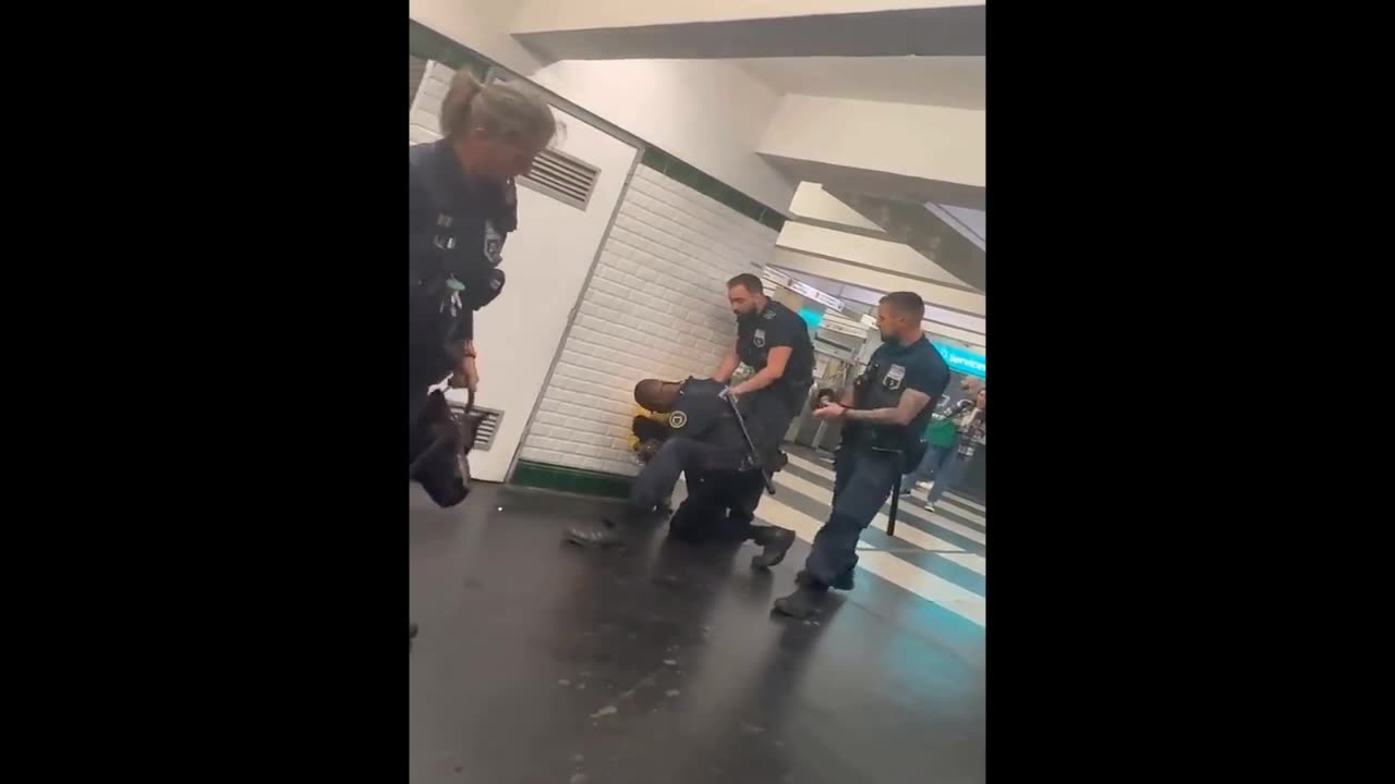 French Subway Guard Punches Man In Stomach