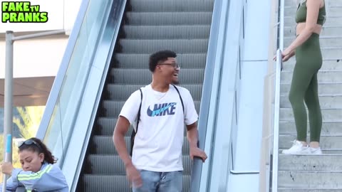 TOUCHING HANDS ON THE ESCALATOR