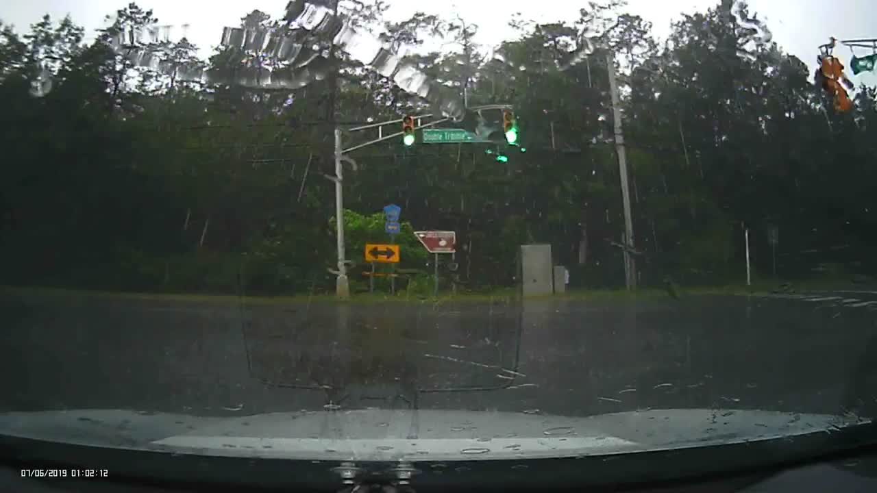 Lightning Crashes Close to Car