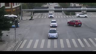 Viral: Overworked China Traffic Cop Collapses In Street