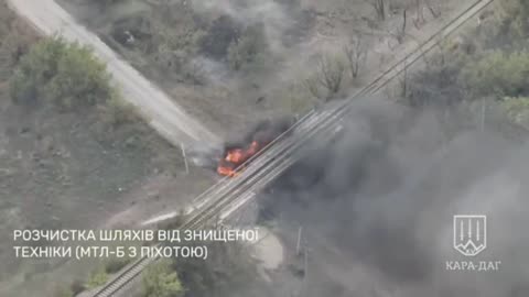 👀🔥 Ukrainian tank rams a burning Russian MT-LB that was obstructing