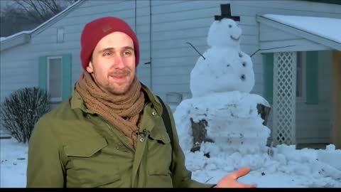 Driver tries to run over Kentucky snowman which had tree trunk has base