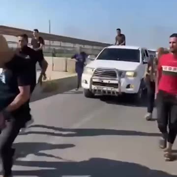 Hamas fighters entering Israel settlements