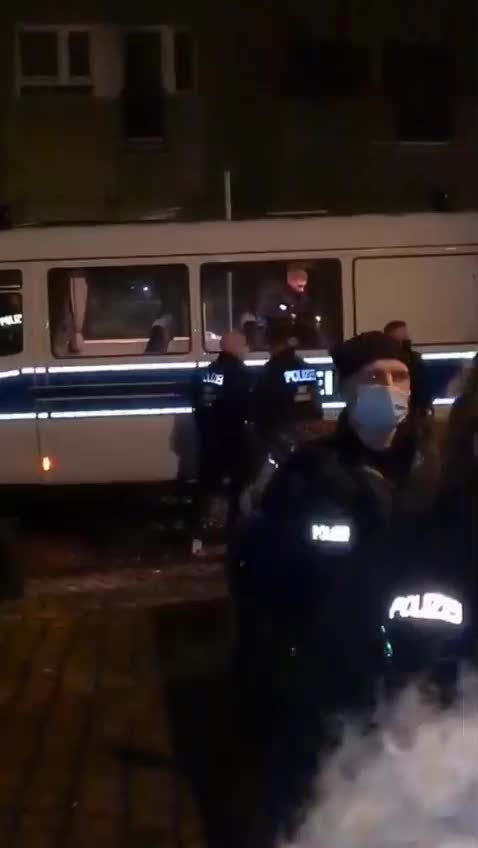 Police BEAT a woman in Berlin