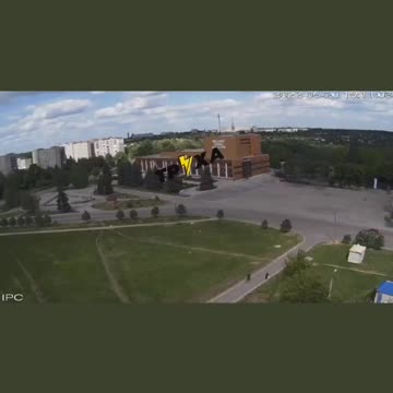 Giant bomb is dropped on building causing huge explosion and smoke