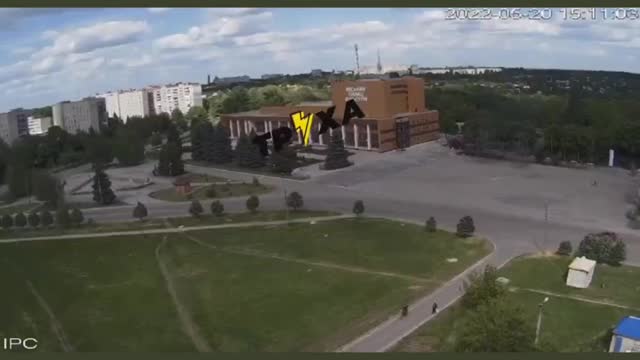 Giant bomb is dropped on building causing huge explosion and smoke