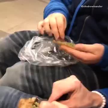 Guys roll up a few blunts at nyc subway station