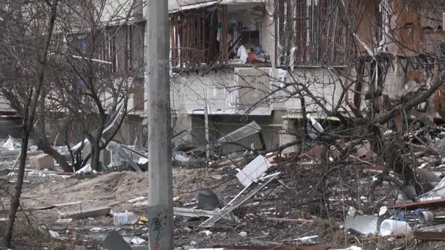 Ukrainian journalist shown bombed family home