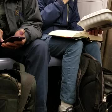 Man in blue jacket picks nose eats boogers