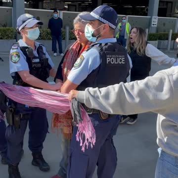 Australia: Protesters Attempt to Prevent Arrest of Peaceful Protesters. police assault unarmed women