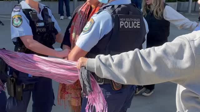 Australia: Protesters Attempt to Prevent Arrest of Peaceful Protesters. police assault unarmed women