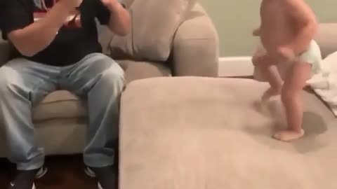 A child plays with his father as a fight