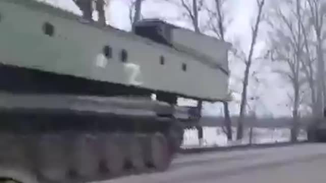 Battle tanks T-72B3, heavy flamethrower systems TOS-1A Soncepek, on the border with Ukraine