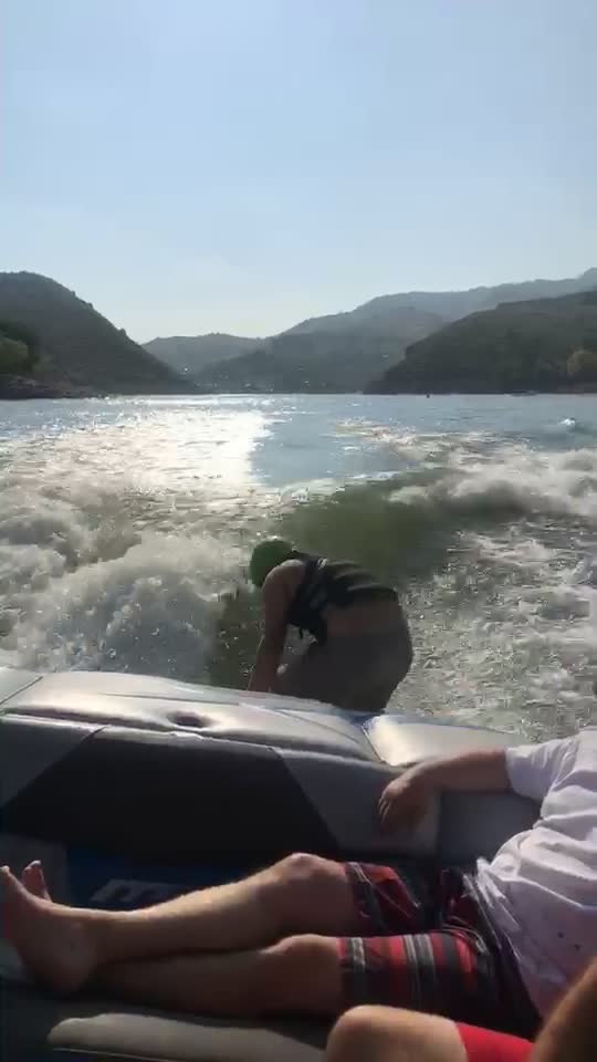Wake surfing - The Kid makes it look Easy.