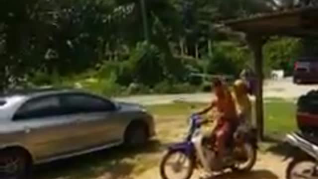 Funny.. Wheelie with mother