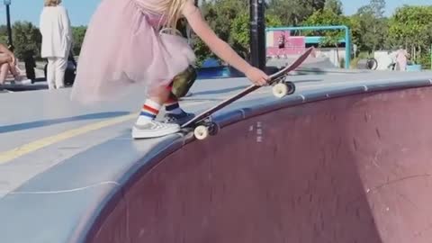 Little girl skateboarding