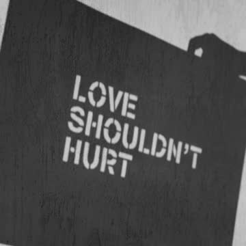 A Worded Message Stenciled On A Board