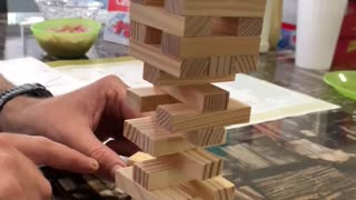 Jenga. Take a block from the bottom and put it on top