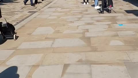 People Form Long Queues for Shops