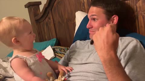 Funny baby and sweet father
