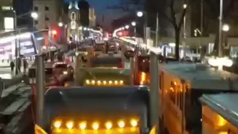 Canadian truckers have parked in front of parliament for the night. The main convoy reaches Ottawa in the morning.