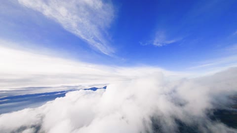 Flying in the clouds.