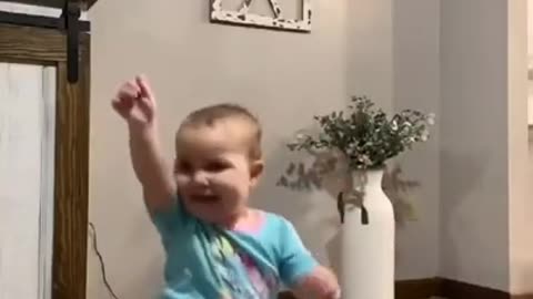 The child dances thinking like a soldier.