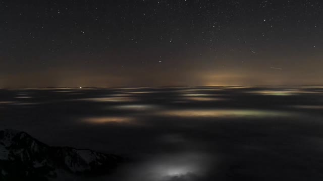 Clouds on a mountain peak