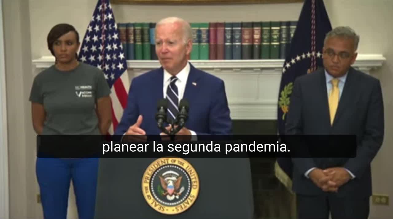 Look at the eyes of the woman beside Biden - More money for the 2nd pandemic -