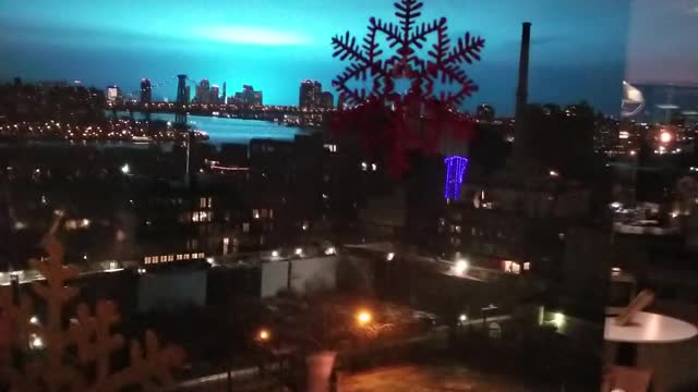 Strange Blue Light Illuminates the NYC Night