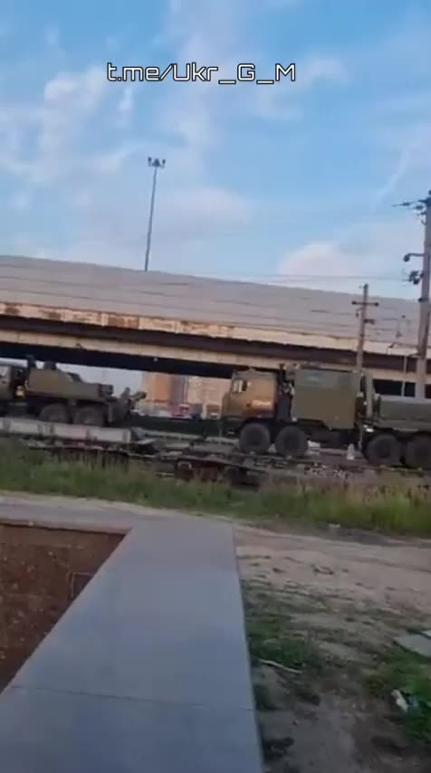 A Russian military train carrying various types of military equipment is en route to the Kursk front