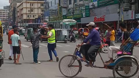 Traffic controlled student in Bangladesh