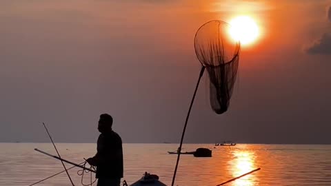 silhouette-of-a-man-fishing