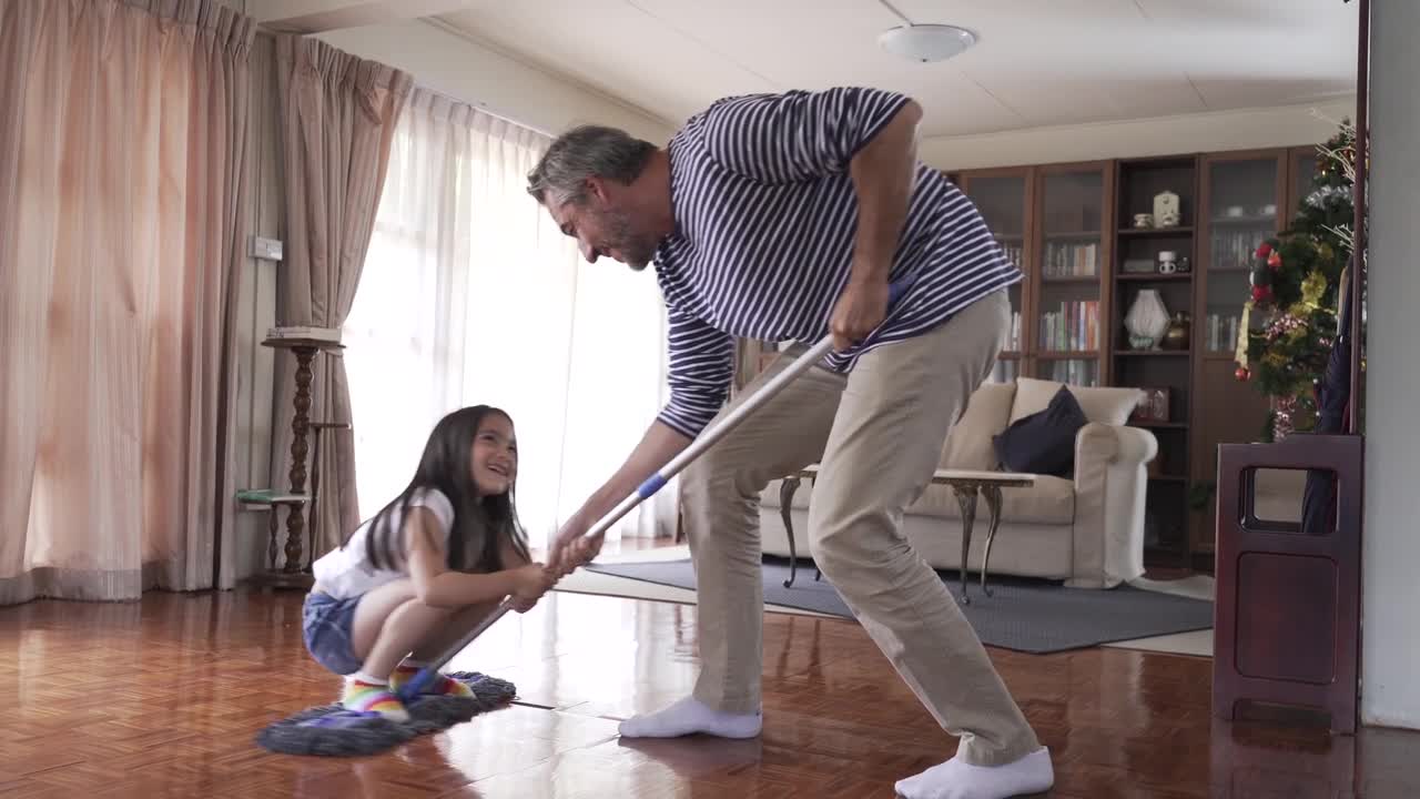 Dad & daughter help together to cleaning house