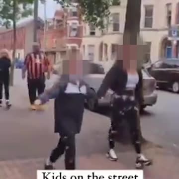 Moment mum smiles as child hurls racist a*use at bypa*sers amid riots