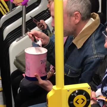 Old man eats entire tub of vanilla tillamook ice cream on subway train