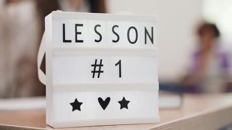 close-up-of-a-small-marquee-sign-on-a-table