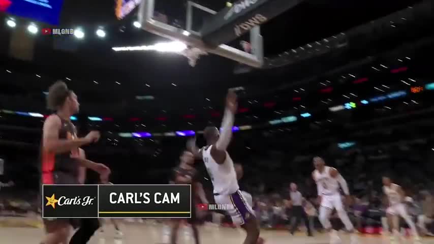 LeBron keeps himself from falling off balance