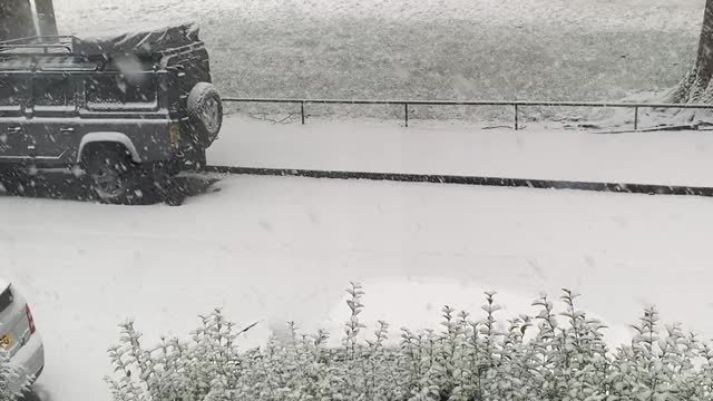 Snowing outside my home