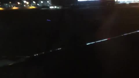 Plane landing at night in Korea