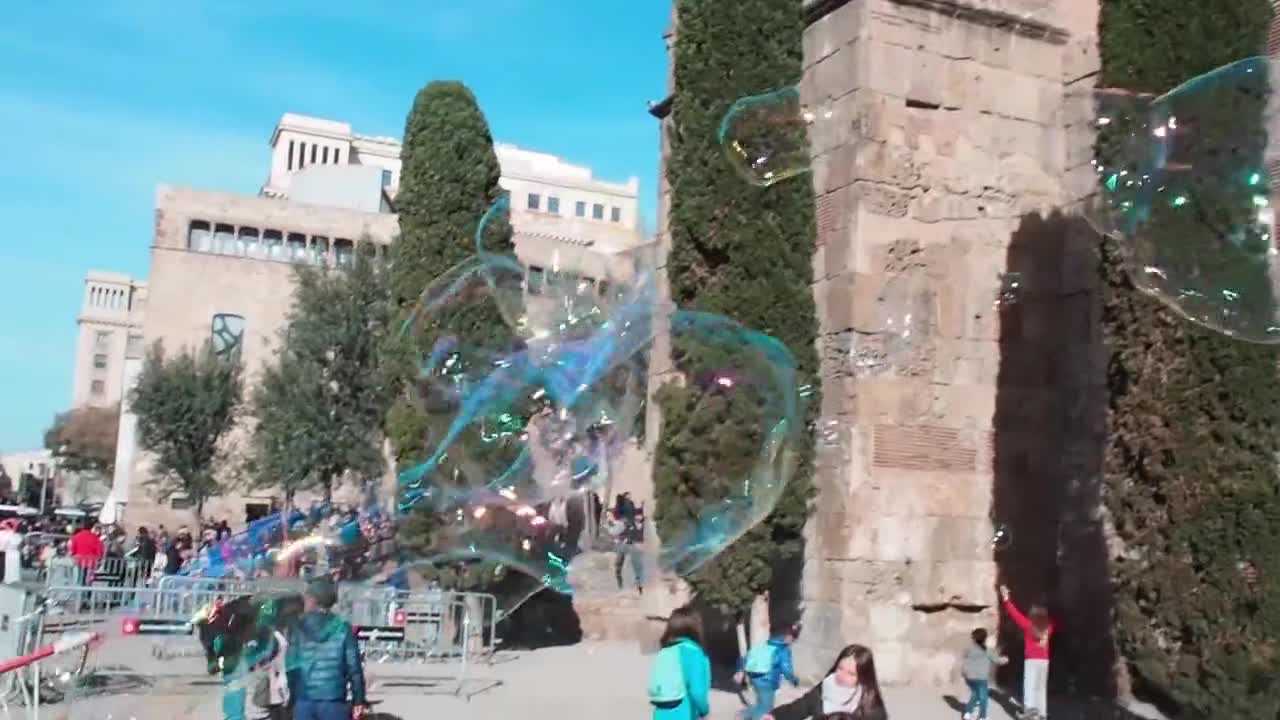 child making bubbles with soap