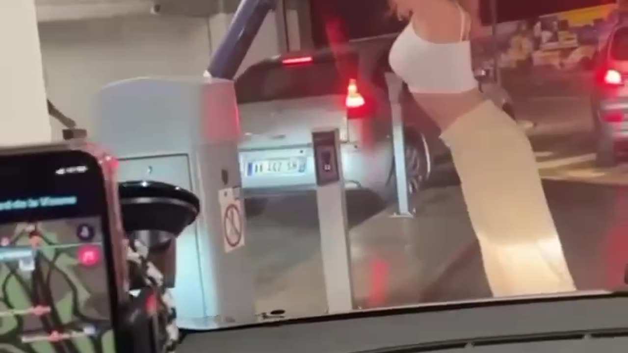 awesome chick let's them out the car park