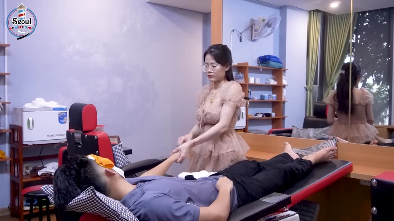 Her small smile surprised while massaging is cute