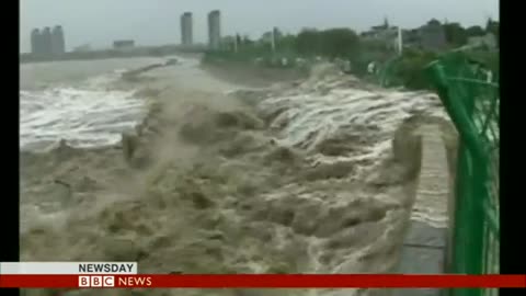 GIANT WAVES BATTER CHINA - BBC NEWS