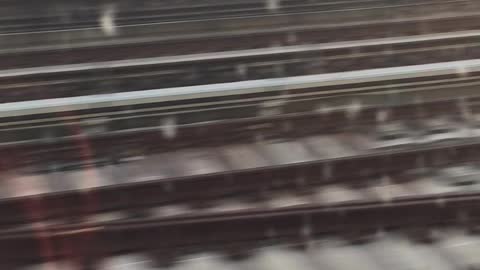 D train running on the F line in Brooklyn